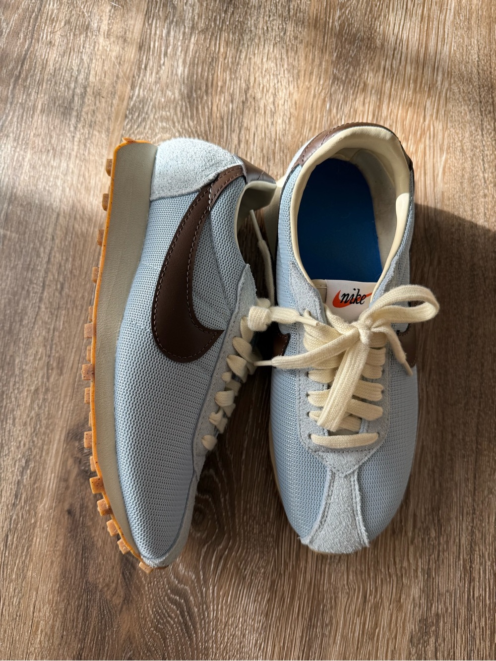 Nike Women’s Light Blue Sneakers with Brown Swoosh and Gum Outsole